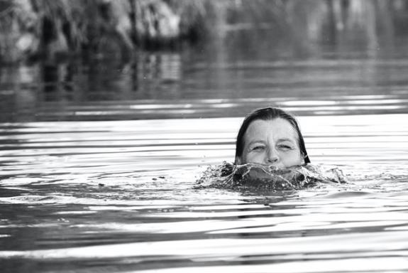 woman swimming in water